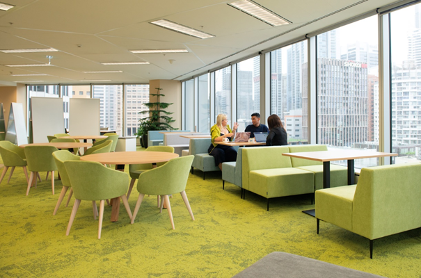 Employees collaborating in one of our revamped Sydney, Australia offices. Note: Based on health official and government guidance, along with local case data, face masks aren't currently required in New South Wales.